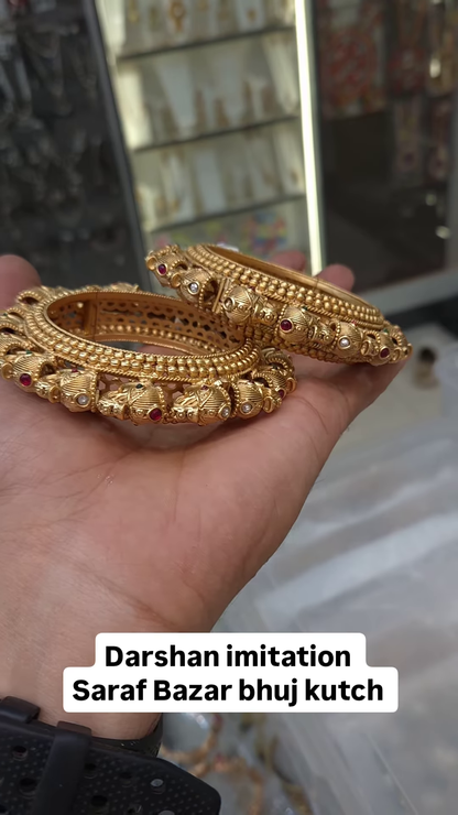 Exquisite Gold-Toned Bangles with Ruby and Pearl Accents