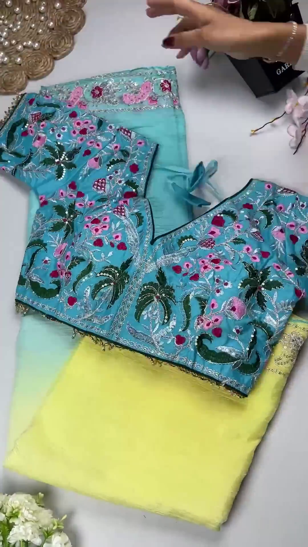 Turquoise Blue Floral Embroidered Blouse with Ombré Pink Crinkle Saree